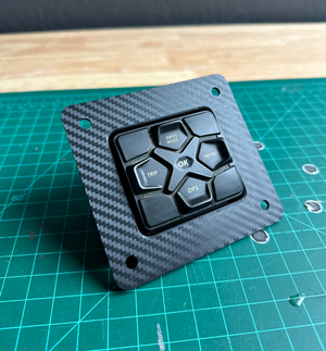 Install view of the StayFlush Motorsports X3 DPS bezel square cutout in a Maverick X3 dash