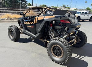 2025 Polaris RZR Pro R two-seat TFBB fastback roll cage with aluminum roof driver side