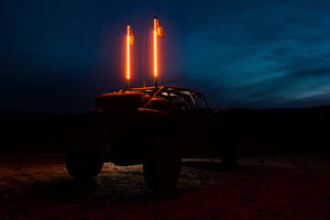 5150 Hyper Color Platinum whip, UTV at dusk with two whips lit orange