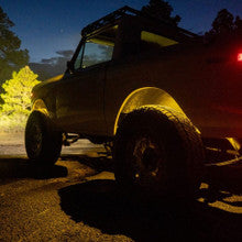 Baja Designs LED, Rock Light in amber installed on Bronco - Dunes 2 Dezert SXS