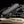 Assault Industries injection-molded UTV belt case with rubber cargo latches closed