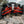 Can-Am Maverick X3 Sidewinder A-Arms in Can-Am Red mounted on machine
