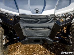 SuperATV grille cover installed on the front of a Can-Am Defender to hold in engine heat