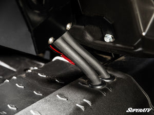 Coolant hoses for the SuperATV second-row heater routed through the Can-Am Defender MAX floor