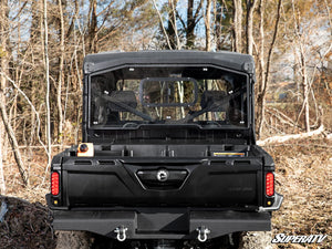 SuperATV sliding rear windshield seen from the Defender bed