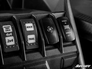 SuperATV heater rocker switches installed in the Can-Am Maverick X3 dash