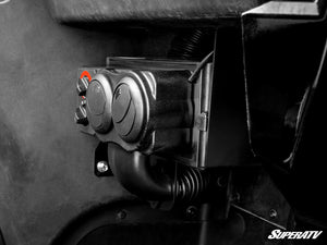 SuperATV cab heater installed under the passenger-side dash of a Can-Am Commander 1000