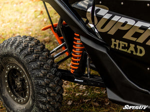 SuperATV Can-Am X3 long travel kit with trailing arms and tie rod assembly