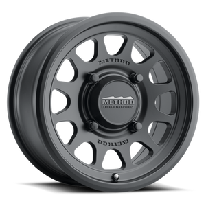 Method 414 Bead Grip Matte Black UTV Wheel with 12-window design, bead hump, and 1600 lb rating for off-road and trail use.