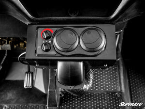 SuperATV cab heater installed under the center dash of a Honda Pioneer 1000