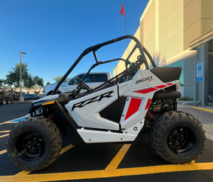 Polaris RZR 200 Geiser kick plates installed interior view