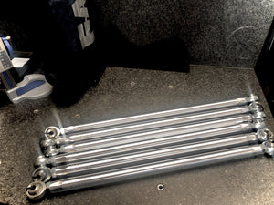 LM UTV Can-Am Maverick X3 64-inch radius rod set detail showing 3/4 JMX heim ends and stainless spacers