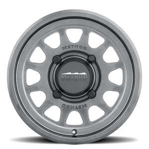 Method 414 Gloss Graphite Bead Grip® UTV Wheel with 12-window design, bead hump, and 1600 lb load rating for dunes and rugged terrain.