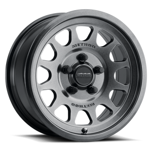 Method 414 Gloss Graphite Bead Grip® UTV Wheel with 12-window design, bead hump, and 1600 lb load rating for dunes and rugged terrain.