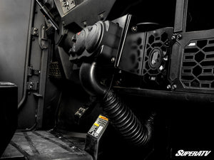 Side view of the SuperATV cab heater and coolant hoses under the Polaris Ranger SP 570 dash