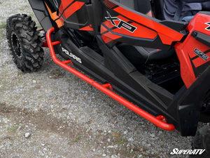 SuperATV Polaris RZR XP 4 Turbo S Rock Sliding Nerf Bars, installed view