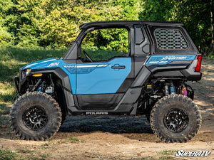 Polaris Xpedition ADV rear side window in a steel frame sealing the cargo area