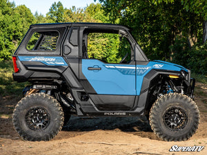 Polaris Xpedition ADV rear side windows bolted to the cage with a bulb seal