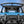 Polaris Xpedition flip windshield opened to the vented position for airflow