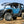 Polaris Xpedition flip windshield adjusted to the full open position on the trail