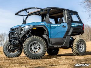 Polaris Xpedition flip windshield adjusted to the full open position on the trail