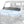 SuperATV Polaris Xpedition dark tint half windshield mounted on the hood