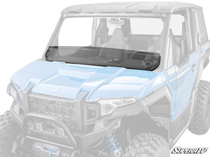 SuperATV Polaris Xpedition dark tint half windshield mounted on the hood