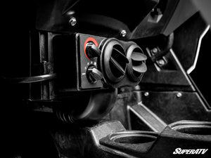 Side view of the SuperATV cab heater installed between the seats of a Polaris RZR XP 1000