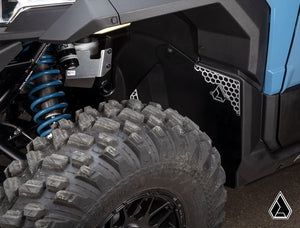 Assault Industries Xpedition fender guards installed in Polaris Xpedition wheel well