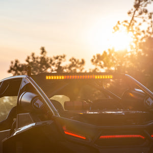 Rigid Industries 28-inch Chase Light Bar with LED brake, reverse, turn signal, and customizable strobe patterns for off-road vehicles.