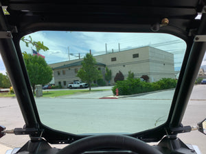 View from inside the Polaris RZR RS1 cockpit looking out through the UTV Zilla laminated glass windshield