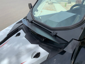 UTV Zilla RS1 windshield with the adjustable flap vent propped open for airflow into the cab