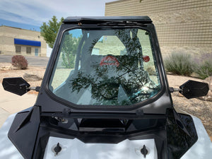 UTV Zilla Polaris RZR RS1 glass windshield viewed straight on, showing the black powder-coated frame