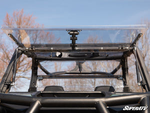 SuperATV flip windshield on a Can-Am Commander, installed close-up