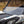 SuperATV half windshield on a Can-Am Maverick Trail, installed close-up