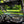SuperATV MaxDrive power flip glass windshield on a Can-Am Commander, profile view