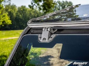 SuperATV MaxDrive power flip glass windshield on a Can-Am Commander, top view