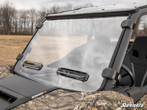 SuperATV vented full windshield on a Can-Am Commander, installed close-up