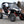 SuperATV flip windshield on a 2013-2018 Can-Am Maverick, side view