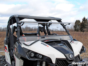 SuperATV flip windshield on a 2013-2018 Can-Am Maverick, installed close-up