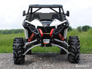 SuperATV half windshield on a 2013-2018 Can-Am Maverick, installed close-up
