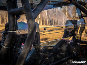 SuperATV rear windshield on a 2013-2018 Can-Am Maverick, installed close-up