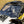 SuperATV flip windshield on a Can-Am Maverick R, installed close-up