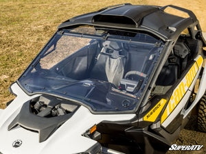 SuperATV flip windshield on a Can-Am Maverick R, installed close-up