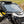 SuperATV glass windshield on a Can-Am Maverick R, installed close-up