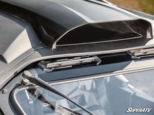 SuperATV glass windshield on a Can-Am Maverick R, hardware detail