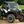 SuperATV flip down glass windshield on a Can-Am Maverick Sport, installed close-up