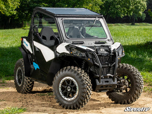 SuperATV flip down glass windshield on a Can-Am Maverick Sport, installed close-up