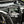 SuperATV flip down glass windshield on a Can-Am Maverick Sport, mounted view