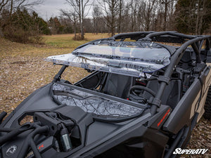 SuperATV flip windshield on a Can-Am Maverick X3, installed close-up